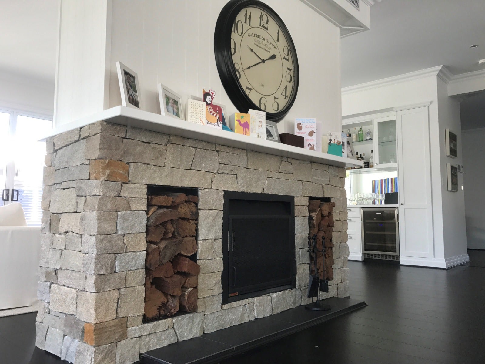 cladded fireplace in a rustic farmhouse country design from amber