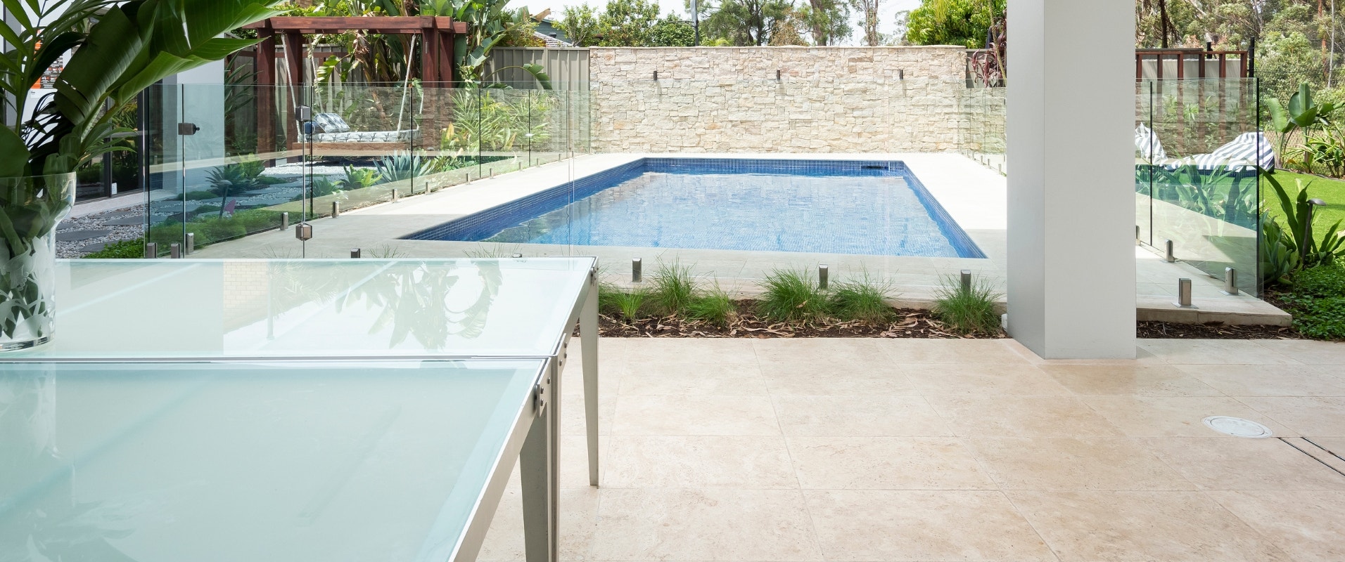 limestone pavers around a pool and alfresco, purchased from amber