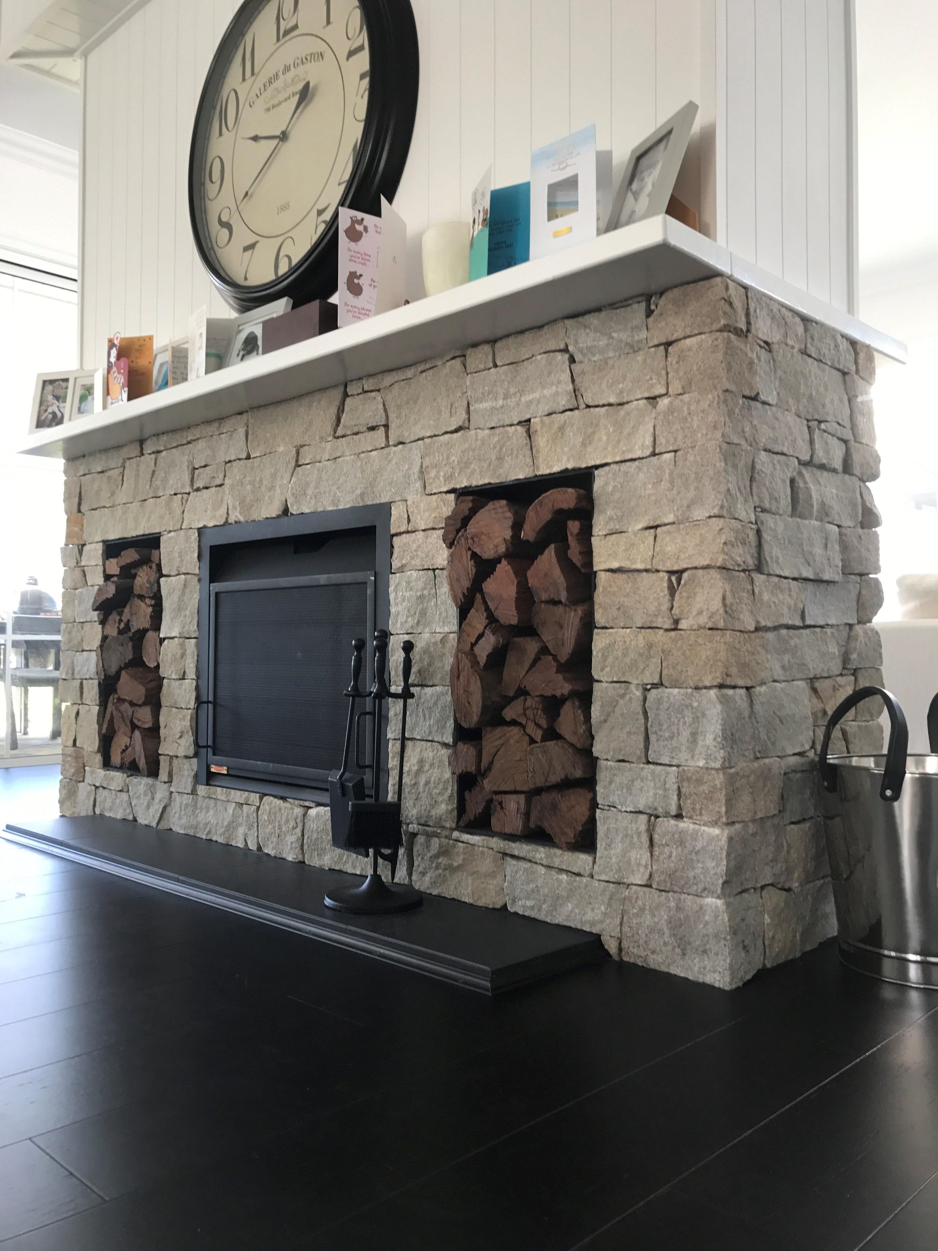 cladded fireplace in a rustic farmhouse design from amber