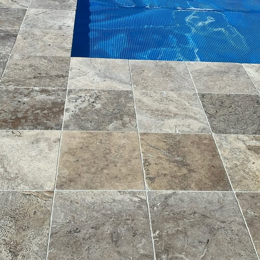 How To Lay Travertine Tiles Around A Pool