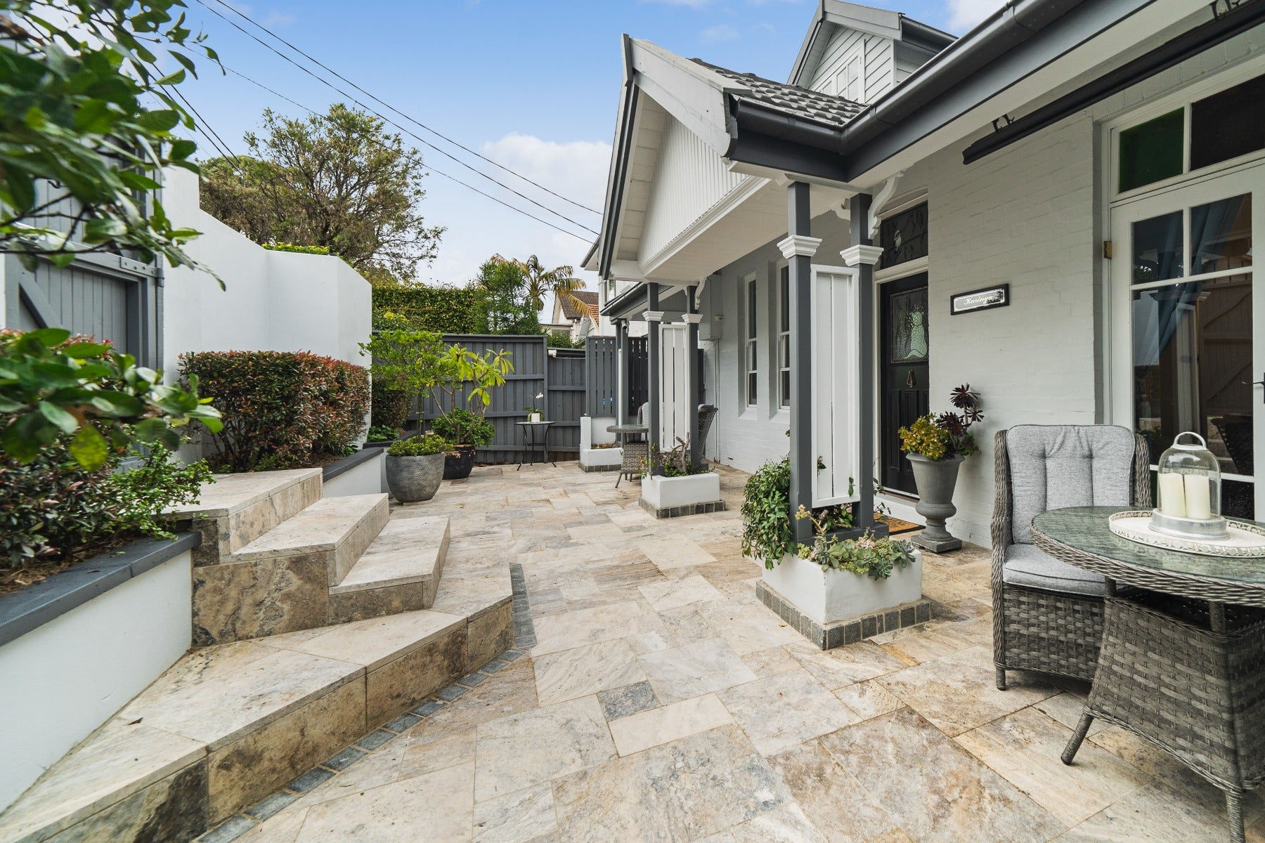 travertine french pattern pavers in alfresco area