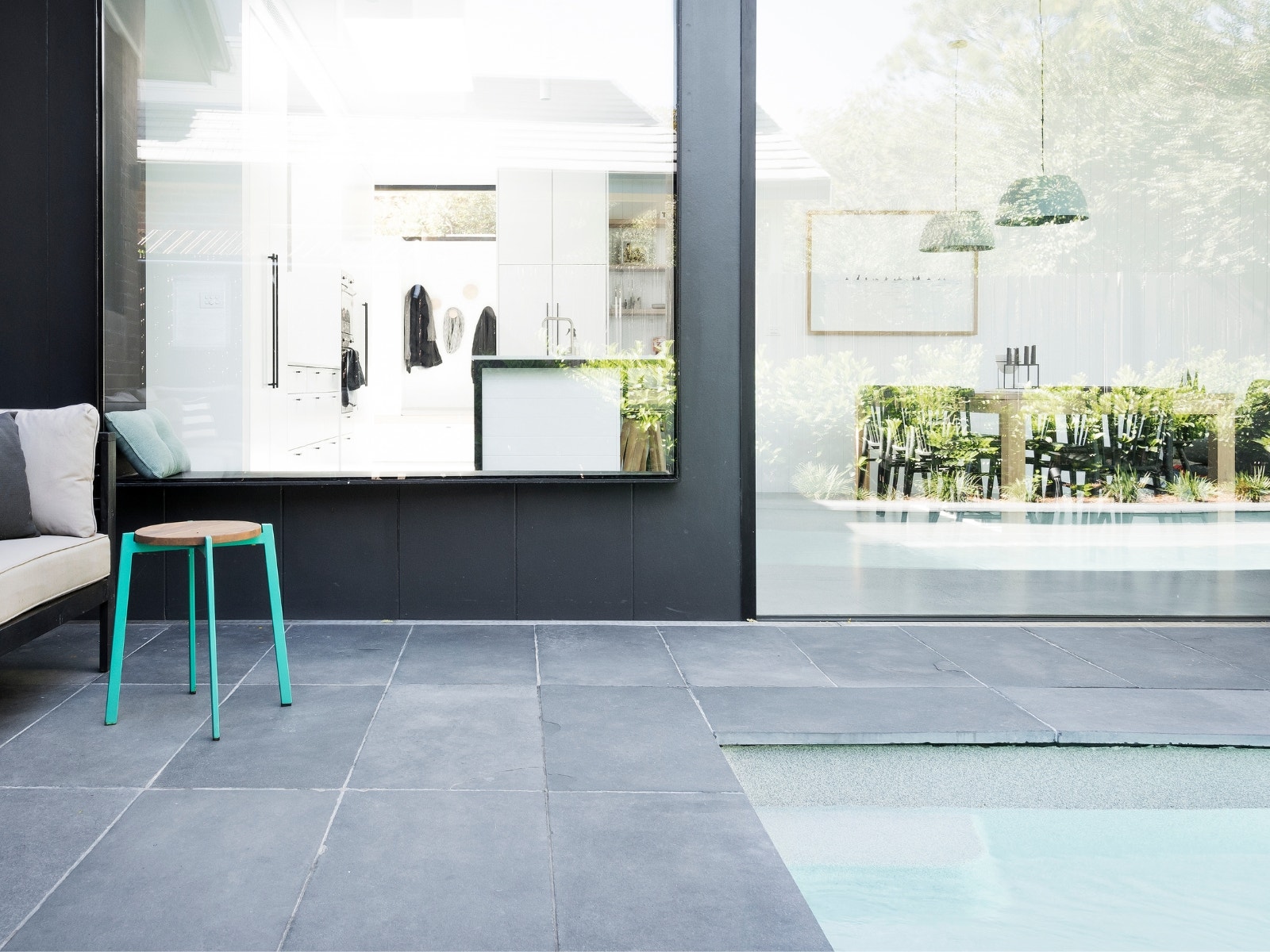contemporary bluestone pavers used around a swimming pool. purchased from amber