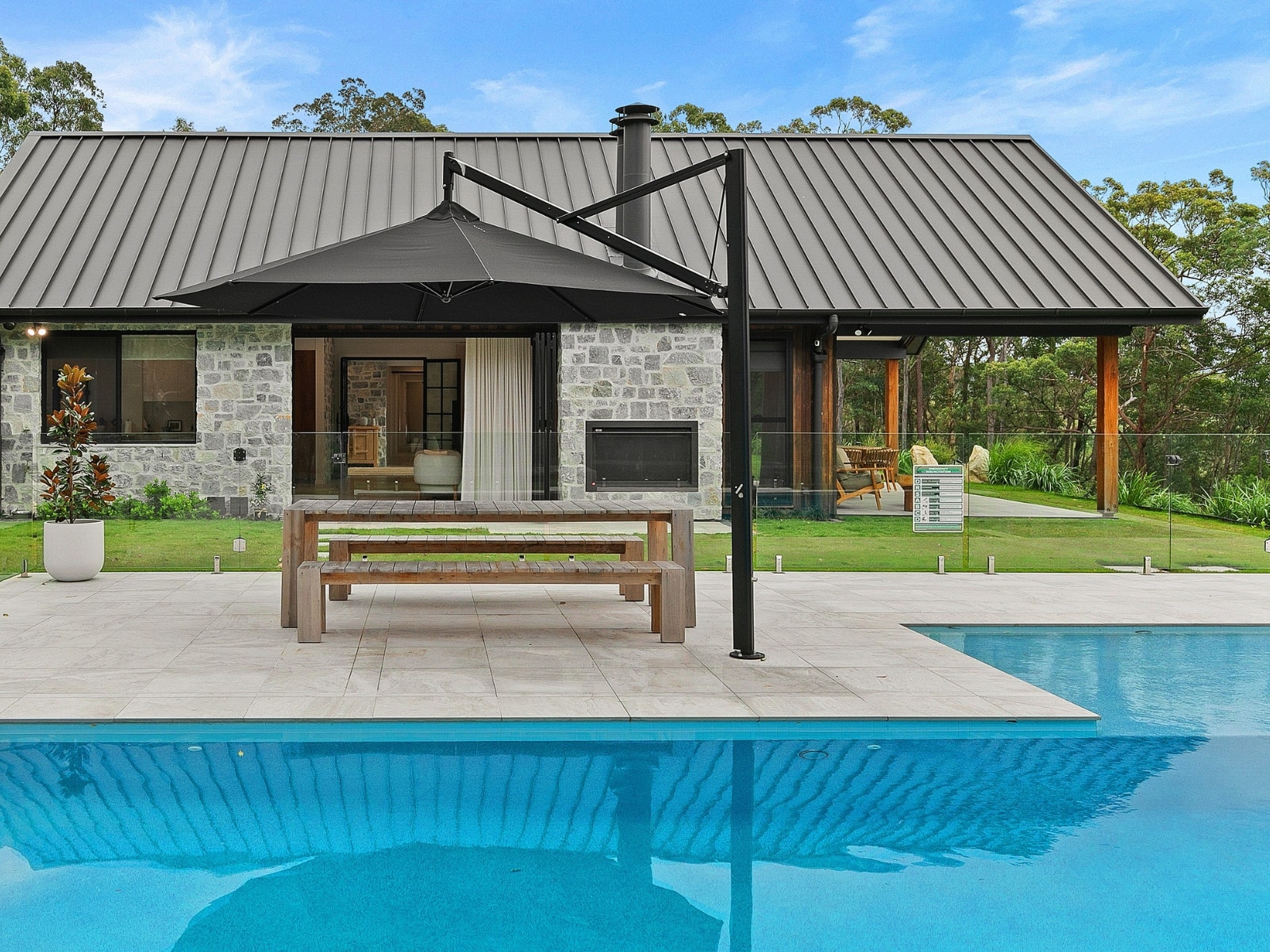 country style project by amber with outdoor pool pavers and cladding purchased from amber albion
