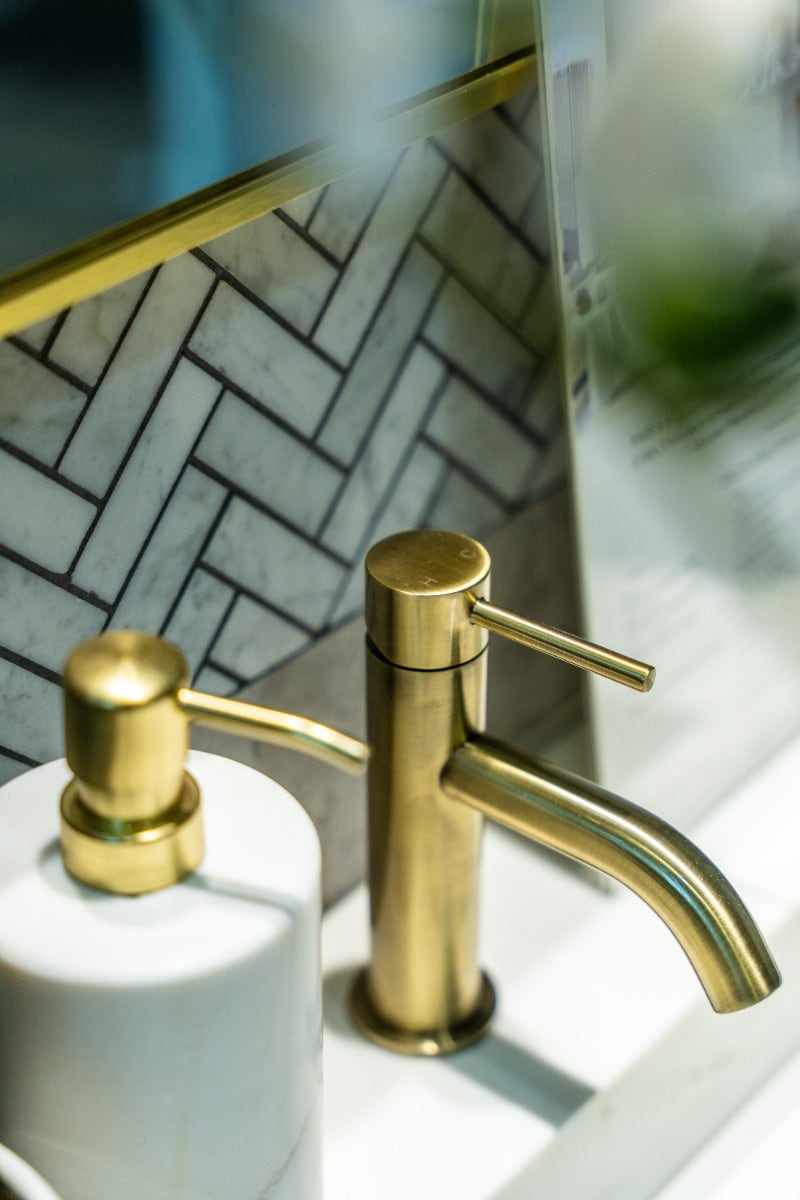 Amber Northlakes Bathware featuring gold bathroom taps