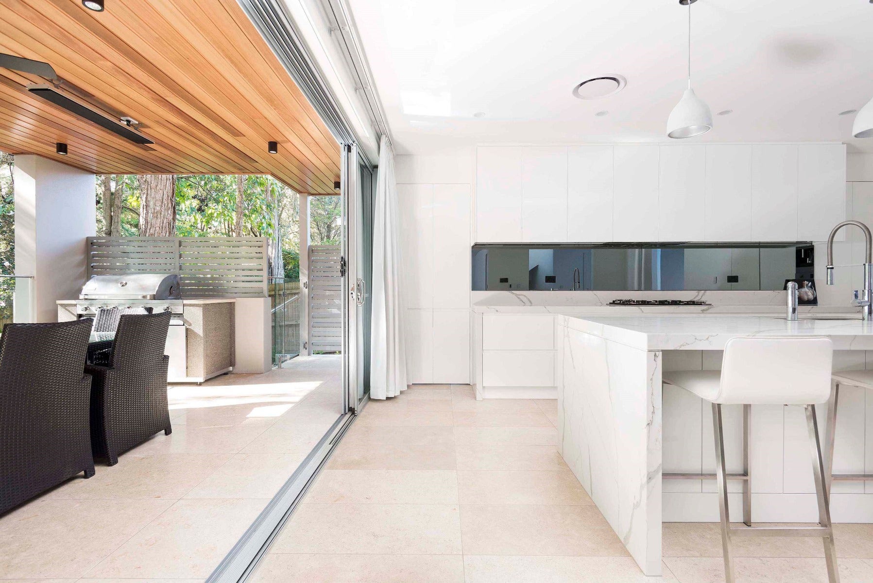 Chic interior design showcasing travertine tiles, which bring a sense of luxury and natural elegance to the space. purchased from amber